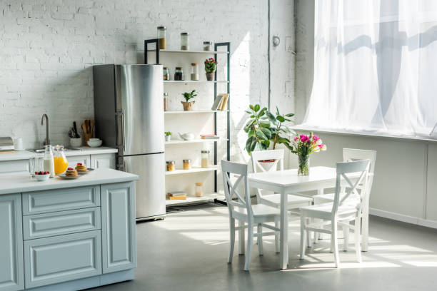 istock interior of modern light kitchen during sunny day 973089088