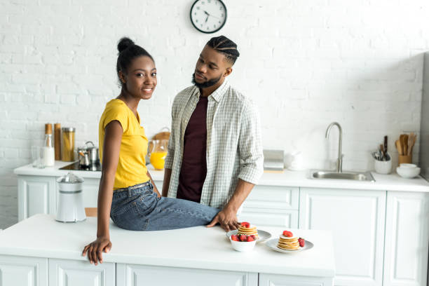 istock african american couple at modern light kitchen 973089178