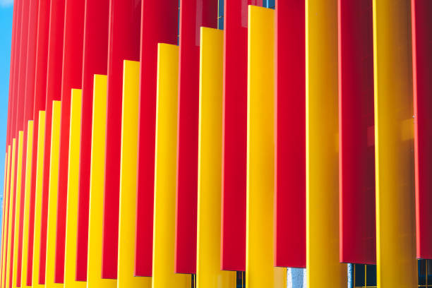 istock Red and yellow stripes on the sky background 973099122