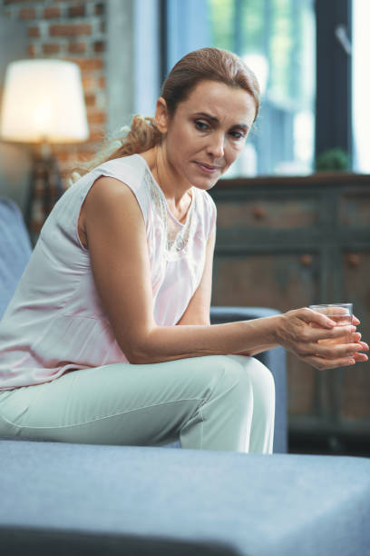 istock Unhappy mature woman diagnosing with depression 973102670