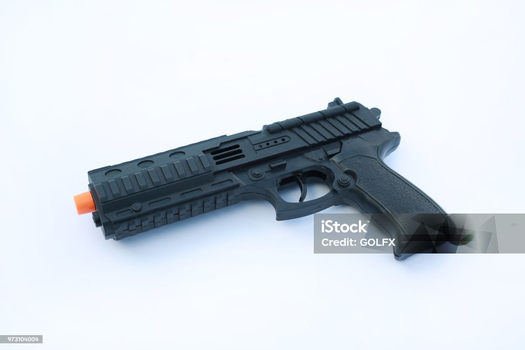Foto de Pistola De Brinquedo De Plástico Preto Sobre Fundo Branco e mais  fotos de stock de Alvo - iStock