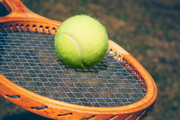 istock Tennis ball on racket 973108932