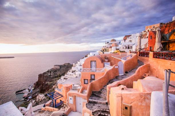 istock Oia sunset in Santorini island, Greece 973109022