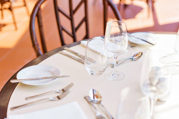 istock Classic Dinnerware in the restaurant. Table appointments for dinner on terrace 973112540