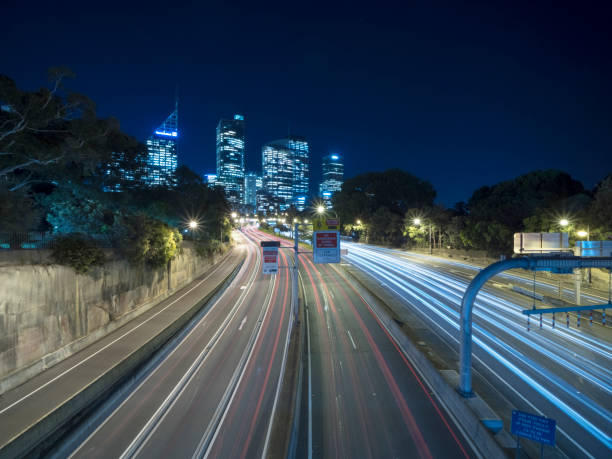 istock rush-hour traffic at night in downtown Sydney 973116386