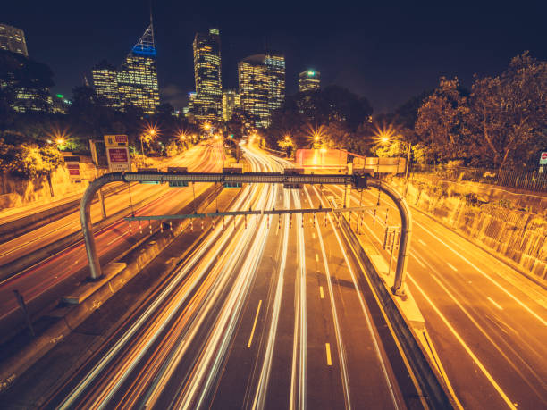 istock rush-hour traffic at night in downtown Sydney 973116422
