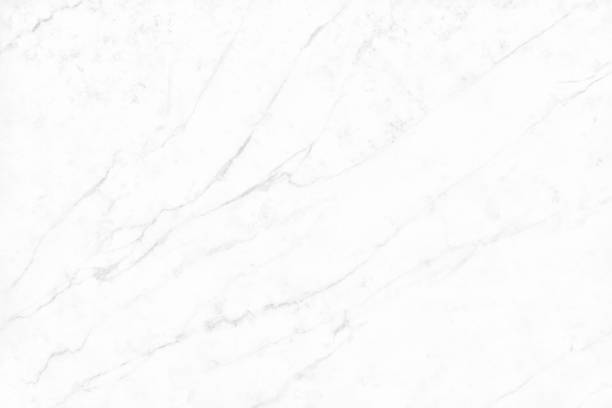 istock White gray marble texture in natural pattern with high resolution for background and design art work. Tile stone floor. 973117094