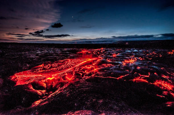 Red molten lava flow from Kilauea volcano Red glowing lava flow from Kilauea volcano, Hawaii, USA kīlauea volcano photos stock pictures, royalty-free photos & images