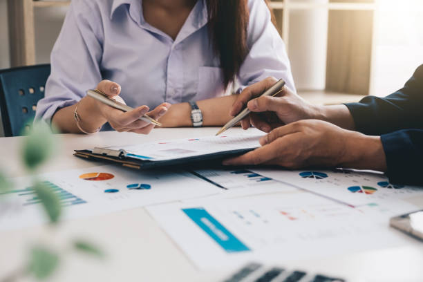istock Business People Analyzing Statistics Business Documents, Financial Concept 973142504