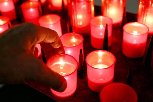 istock Votive candles in a christian church 973143320