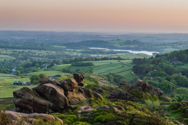 istock Sunset lights the heather and rocks at Ramshaw Rocks 973158802