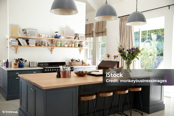 Large Family Kitchen In Period Conversion House Angled View Stock Photo - Download Image Now