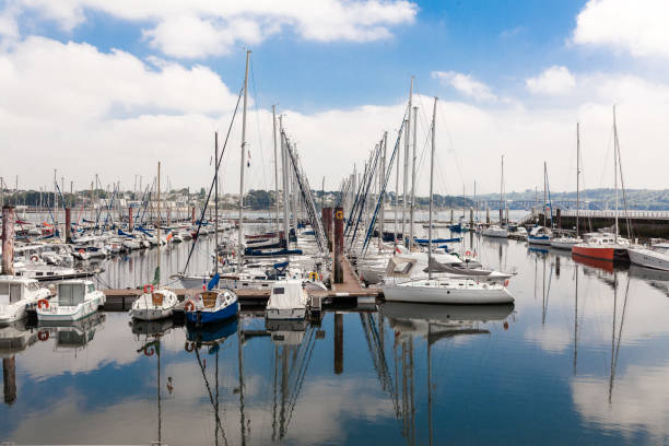 Brest, France 28 May 2018 Panoramic outdoor view of sete marina Many small boats and yachts aligned in the port. Calm water and blue cloudy sky. Brest, France 28 May 2018 Panoramic outdoor view of sete marina Many small boats and yachts aligned in the port. Calm water and blue cloudy sky brest brittany photos stock pictures, royalty-free photos & images