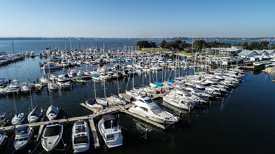 Boating marina with many yachts and speedboats on Swan River in Perth, Western Australia