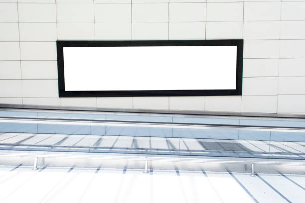 istock One big horizontal / landscape orientation blank billboard in public transport with blurred passenger background 973174378