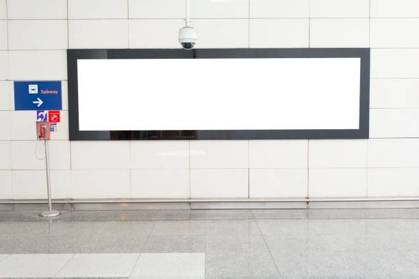 istock One big horizontal / landscape orientation blank billboard in public transport with blurred passenger background 973174426
