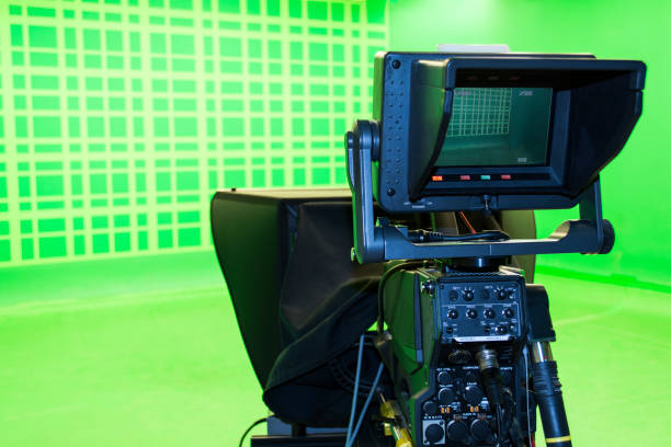 istock LCD display screen on a High Definition TV camera in a green screen studio. 973177328