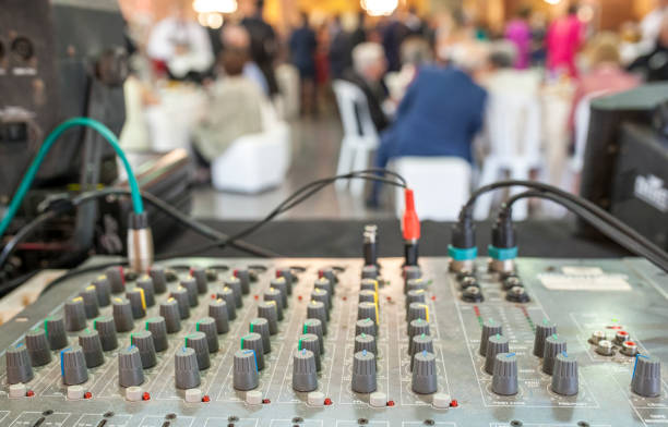 istock DJ soundboard at work white the guests are dinning 973188064