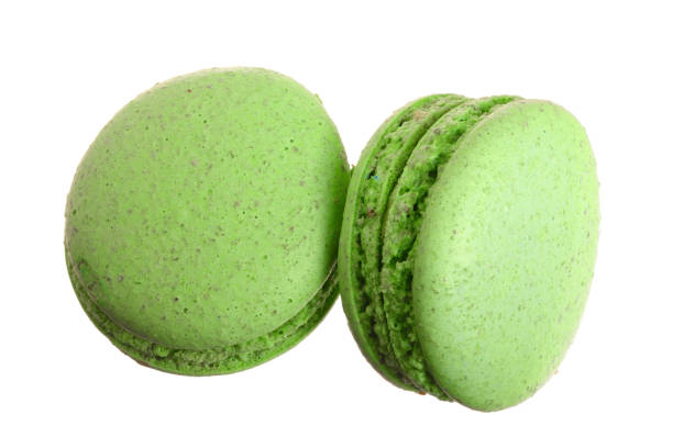 istock green macaroon isolated on white background without a shadow closeup. Top view. Flat lay 973191306