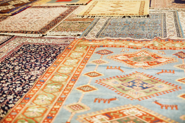 rugs and carpets on the floor - carpet rug persian rug persian culture imagens e fotografias de stock