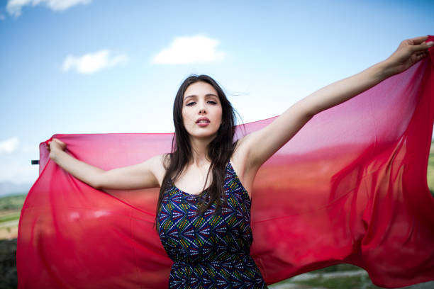 istock a young woman in the spring 973200360