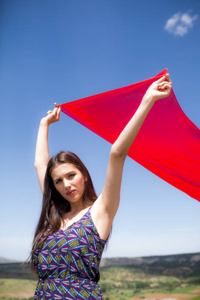 istock a young woman in the spring 973203218