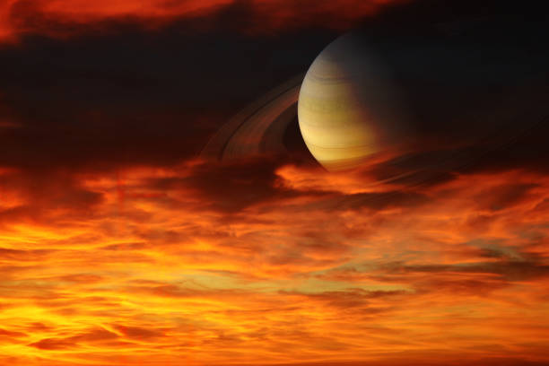 istock Saturn back night cloud on sea ,concept Saturn near Earth 973209548