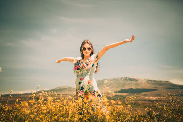istock a young woman in the spring 973210122