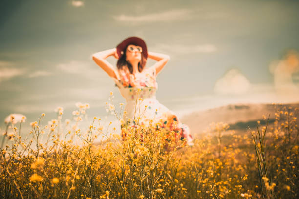female model photography between flowers