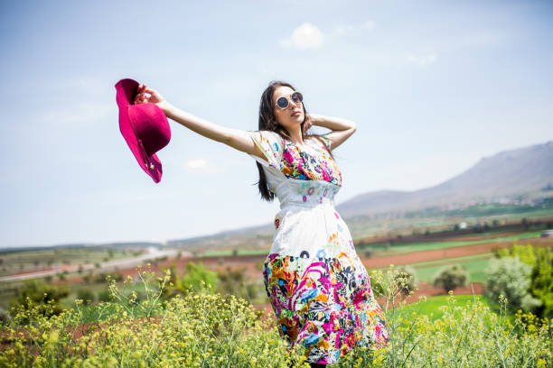 istock a young woman in the spring 973210330