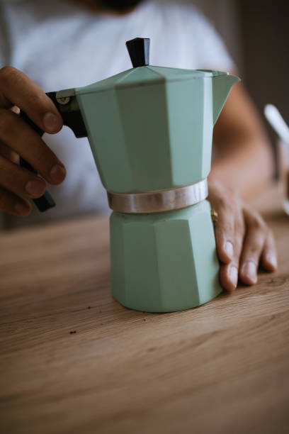 istock Preparing Coffee In A Moka Pot 973212790