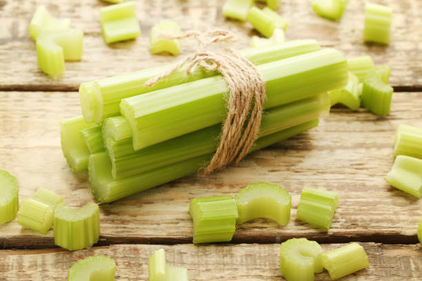 istock Celery on the wooden table 973213118