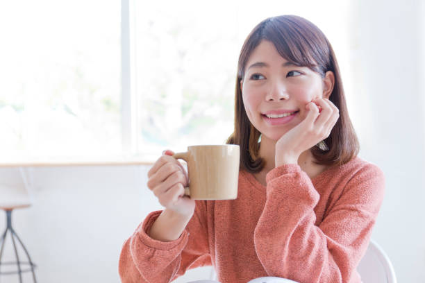 istock A woman relaxing with coffee 973213532