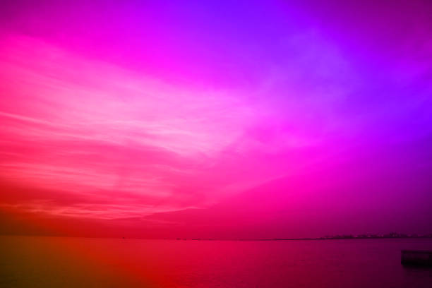 reflection of sunset heap cloud on sea surface
