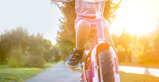 istock Girl riding bicycle 973258890