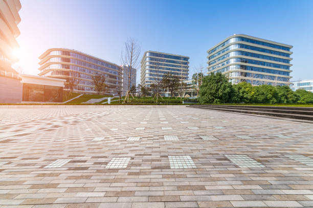 istock Panoramic skyline and modern business office buildings with empty road,empty concrete square floor 973265726