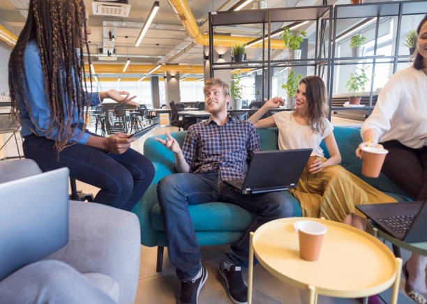 istock Young coworkers in modern office 973265964