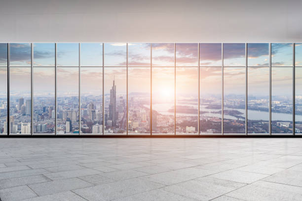 istock Panoramic skyline and buildings from glass window 973266640