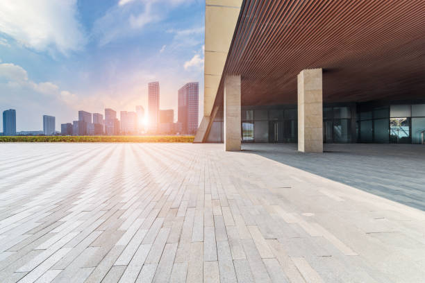 istock Panoramic skyline and modern business office buildings with empty road,empty concrete square floor 973266864