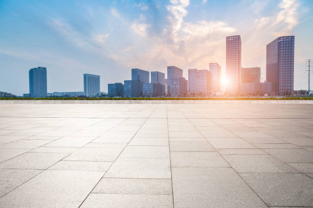 istock Panoramic skyline and modern business office buildings with empty road,empty concrete square floor 973266976