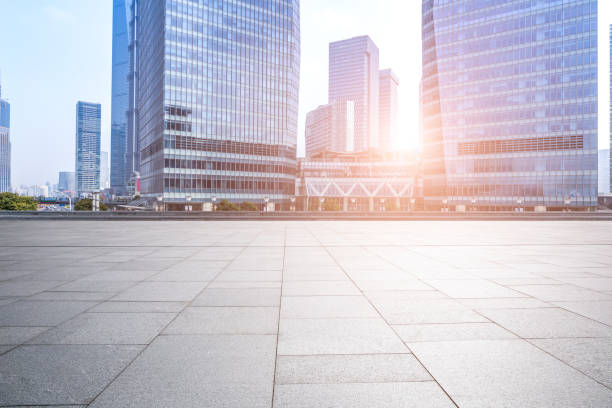 istock Panoramic skyline and modern business office buildings with empty road,empty concrete square floor 973269876