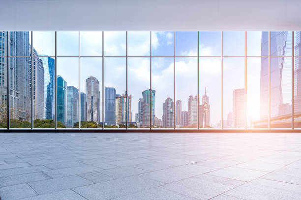 istock Panoramic skyline and buildings from glass window 973270380