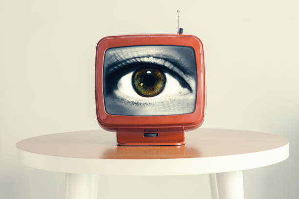 female eye in an old retro tv screen. creative concept. l - spirituality eyesight space abstract imagens e fotografias de stock