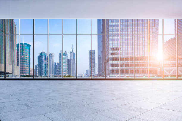 istock Panoramic skyline and buildings from glass window 973271724