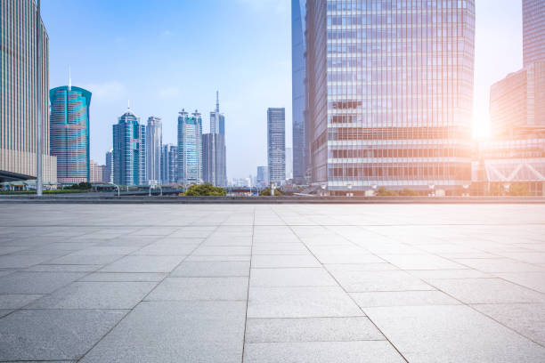 istock Panoramic skyline and modern business office buildings with empty road,empty concrete square floor 973271788