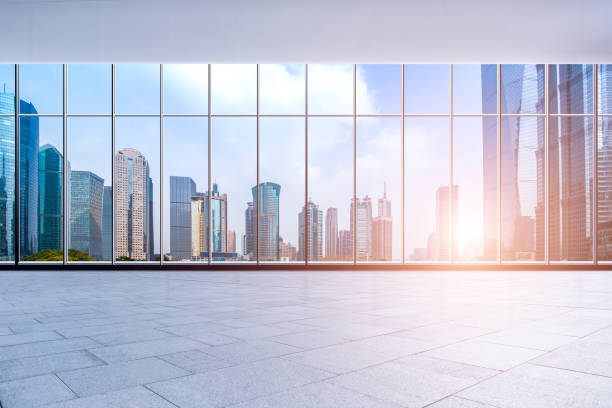 istock Panoramic skyline and buildings from glass window 973274996
