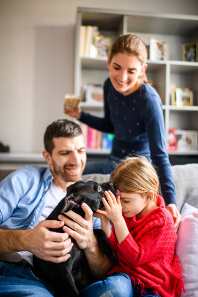 istock Family with child and a dog 973276900