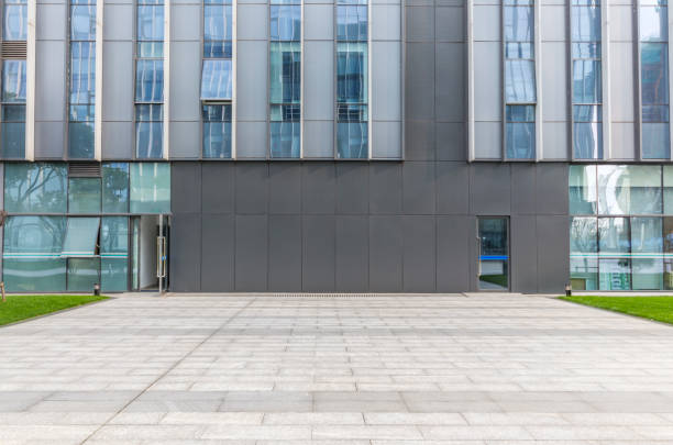 istock Panoramic skyline and modern business office buildings with empty road,empty concrete square floor 973277352
