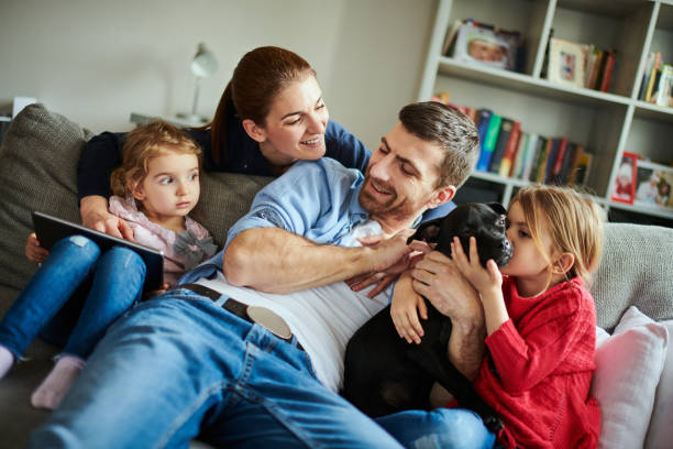 istock Family with children and a dog 973278358