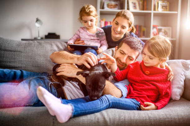 istock Family with children and a dog 973278974